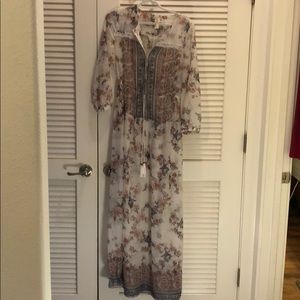 Long, flowy white floral dress
